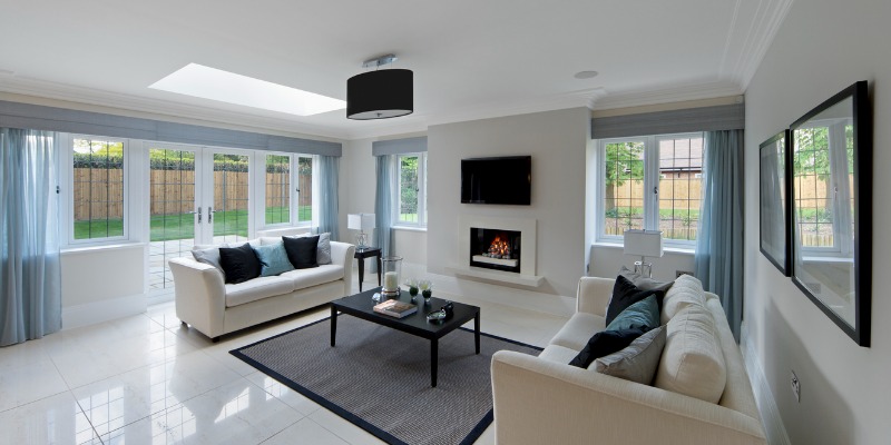 White living room with fireplace