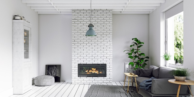 White living room with white brick fireplace