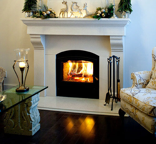 wood burning fireplace in white
